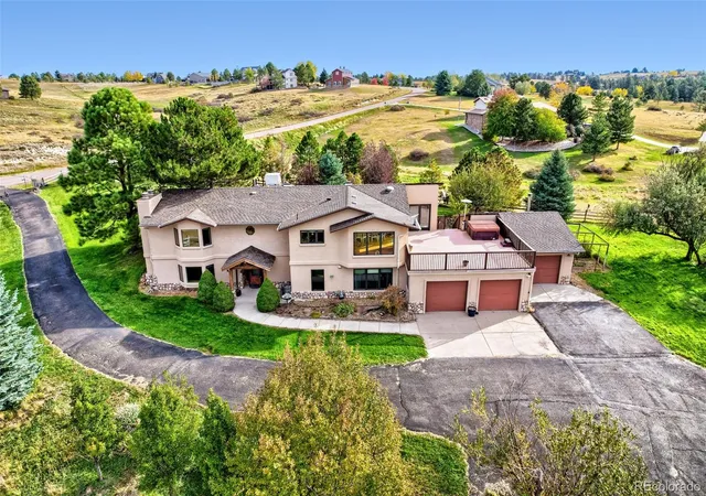 Photo 1 of Single family home for sale at 10620 E Pinewood Dr, Parker, CO 80138 | MLS# 8729512 | Listing updated on 2026-10-26