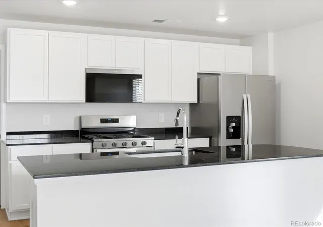 Photo 4 of Townhouse for sale at 21269 E 65th Avenue, Aurora, CO 80019 | MLS# 7065271 | Listing updated on 2026-10-29