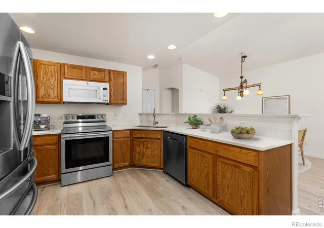 Photo 2 of Condo for sale at 1703 Whitehall Dr #H, Longmont, CO 80504 | MLS# IR1071001 | Listing updated on 2026-10-22