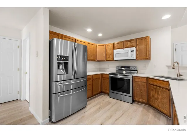 Photo 3 of Condo for sale at 1703 Whitehall Dr #H, Longmont, CO 80504 | MLS# IR1071001 | Listing updated on 2026-10-22