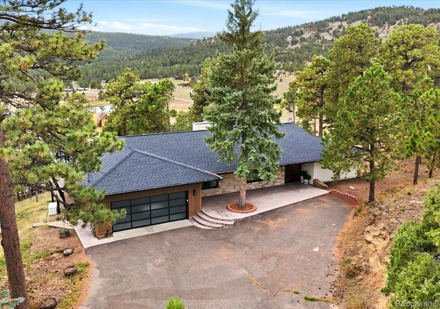 Photo 1 of Single family home for sale at 6629 Jungfrau Way, Evergreen, CO 80439 | MLS# 9809025 | Listing updated on 2026-10-27