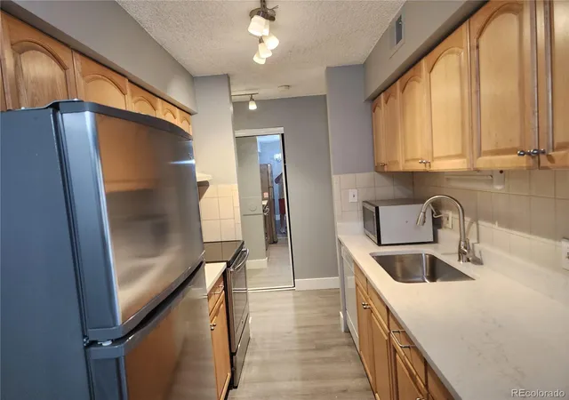 Photo 4 of Condo for sale at 7695 E Quincy Ave #201, Denver, CO 80237 | MLS# 6812891 | Listing updated on 2026-10-23