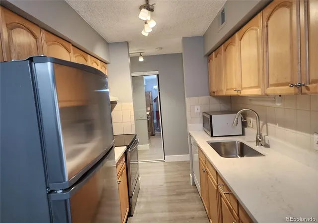 Photo 3 of Condo for sale at 7695 E Quincy Ave #201, Denver, CO 80237 | MLS# 6812891 | Listing updated on 2026-10-23