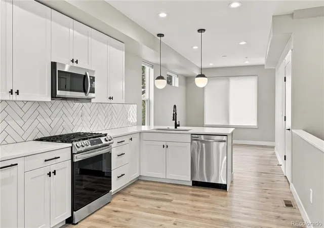 Photo 1 of Townhouse for sale at 4925 W 10th Avenue #101, Denver, CO 80204 | MLS# 1981181 | Listing updated on 2026-10-23