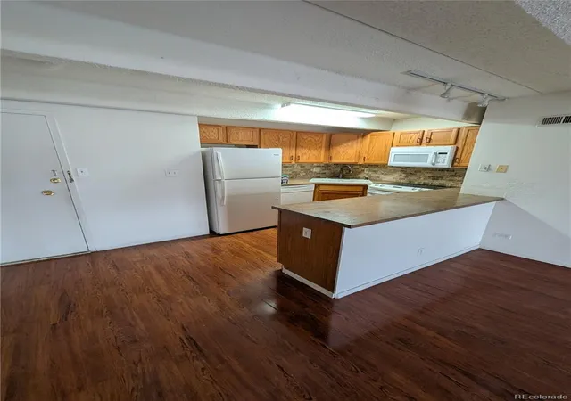 Photo 3 of Condo for sale at 8060 Girard #220, Denver, CO 80231 | MLS# 3985831 | Listing updated on 2026-10-27