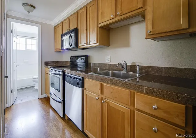 Listing Photo 1 - Condo for sale in building located at 36 N Emerson St, Denver, CO 80218 - Unit #305