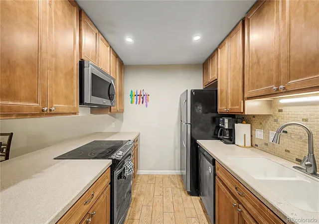 Photo 3 of Condo for sale at 12100 Melody Dr #102, Denver, CO 80234 | MLS# 3742824 | Listing updated on 2026-10-29