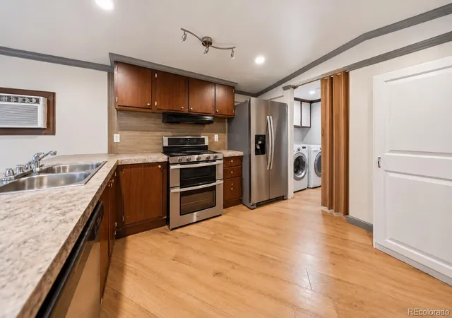 Photo 3 of Single family home for sale at 2840 Blue Jay St #154, Denver, CO 80260 | MLS# 6384779 | Listing updated on 2026-10-28