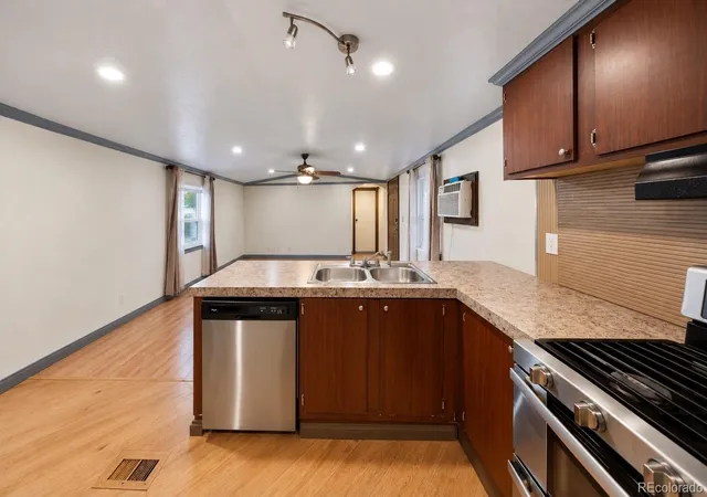 Photo 3 of Single family home for sale at 2840 Blue Jay St #154, Denver, CO 80260 | MLS# 6384779 | Listing updated on 2026-10-28