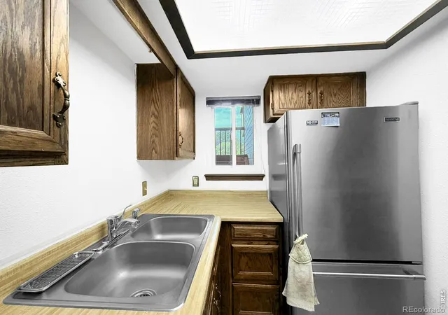 Listing Photo 5 - Condo for sale in building located at 15350 E Arizona Ave, Aurora, CO 80017 - Unit #208