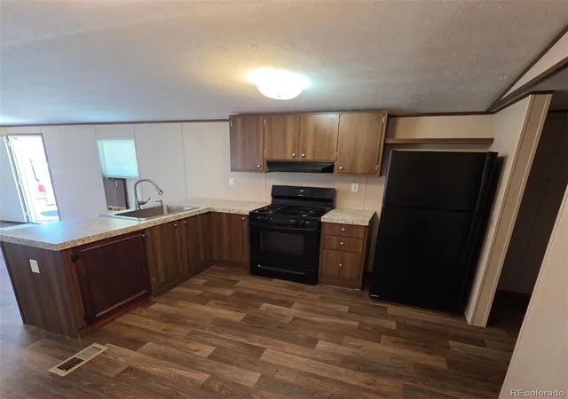 Photo 2 of Manufactured home for sale at 2935 11th Avenue, Evans, CO 80620 | MLS# 5241557 | Listing updated on 2026-10-28