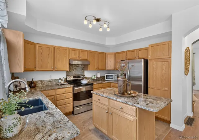 Listing Photo 1 - Condo for sale in building located at 5555 E Briarwood Ave, Centennial, CO 80122 - Unit #403
