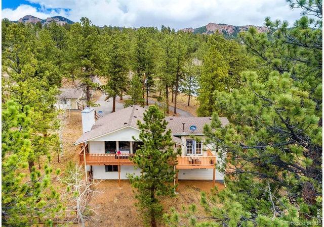 Single family home for sale at 11744 S Stallion Dr, Pine, CO 80470 | MLS# IR1071421