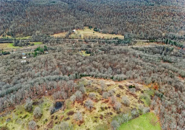 Photo 3 of Land for sale at Corner Of Hwy 71 & Delgado Rd, West Fork, AR 72774 | MLS# 1334999 | Listing updated on 2026-02-12