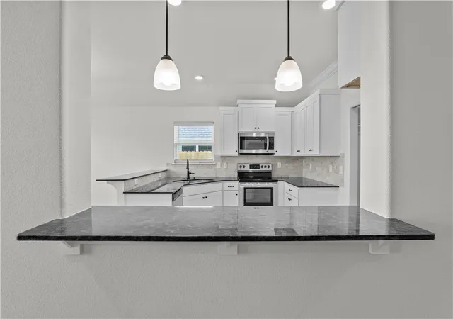 Photo 2 of Single family home for sale at 1207 Greendale Ave, Lowell, AR 72745 | MLS# 1339687 | Listing updated on 2026-07-31