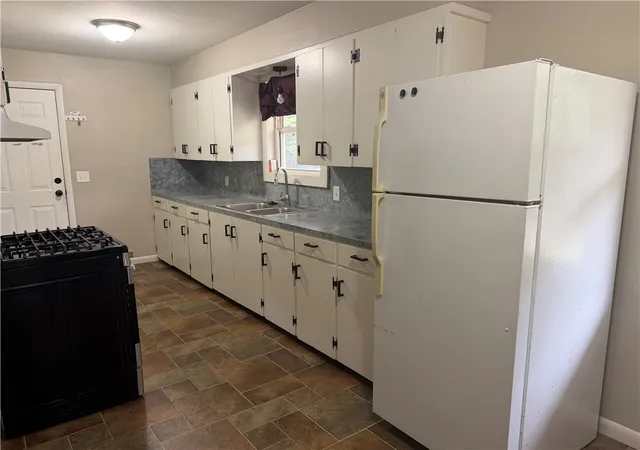 Photo 3 of Single family home for sale at 909 Riddell St, Clarksville, AR 72830 | MLS# 1357511 | Listing updated on 2026-08-03