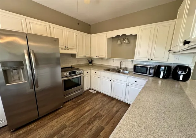 Photo 5 of Single family home for sale at 404 NW 17th Street, Atkins, AR 72823 | MLS# 1357792 | Listing updated on 2026-08-05