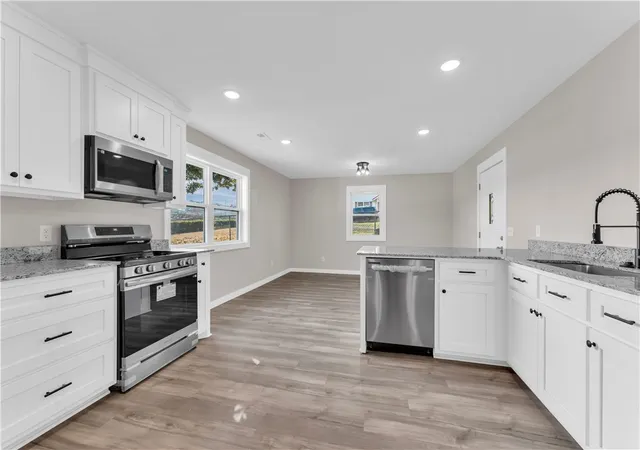 Photo 3 of Single family home for sale at 402 Phillips Ave, Huntsville, AR 72740 | MLS# 1363807 | Listing updated on 2026-10-01