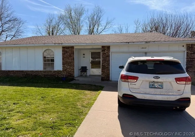 Photo 1 of Single family home for sale at 12422 E 14th Street, Tulsa, OK 74128 | MLS# 2609938 | Listing updated on 2026-07-29
