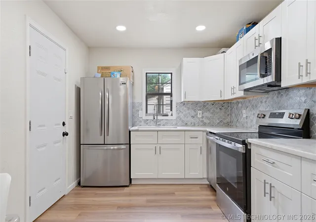 Photo 4 of Single family home for sale at 5040 S 36th Avenue W, Tulsa, OK 74107 | MLS# 2618130 | Listing updated on 2026-06-28