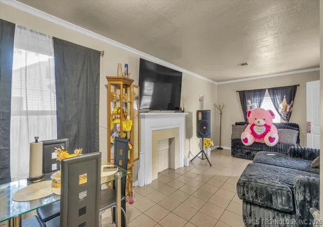 Photo 3 of Single family home for sale at 1946 N Norwood St, Tulsa, OK 74115 | MLS# 2620833 | Listing updated on 2026-07-11