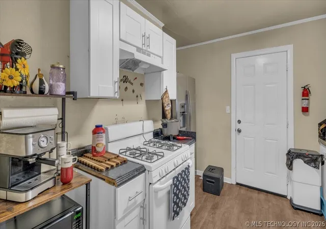 Photo 4 of Single family home for sale at 1946 N Norwood St, Tulsa, OK 74115 | MLS# 2620833 | Listing updated on 2026-07-11