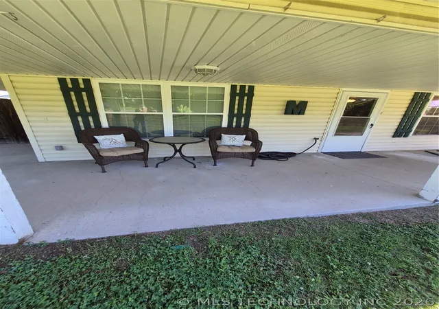 Photo 3 of Single family home for sale at 911 W Creek, Checotah, OK 74426 | MLS# 2621756 | Listing updated on 2026-08-23