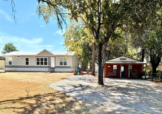 Photo 1 of Manufactured home for sale at 7711 Winding Path, Kingston, OK 73439 | MLS# 2624154 | Listing updated on 2026-09-29