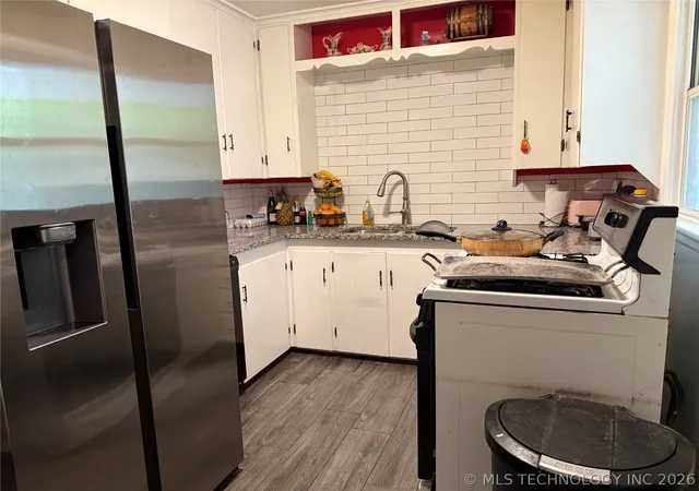 Photo 2 of Single family home for sale at 1620 N Lewis Pl, Tulsa, OK 74110 | MLS# 2624792 | Listing updated on 2026-07-08