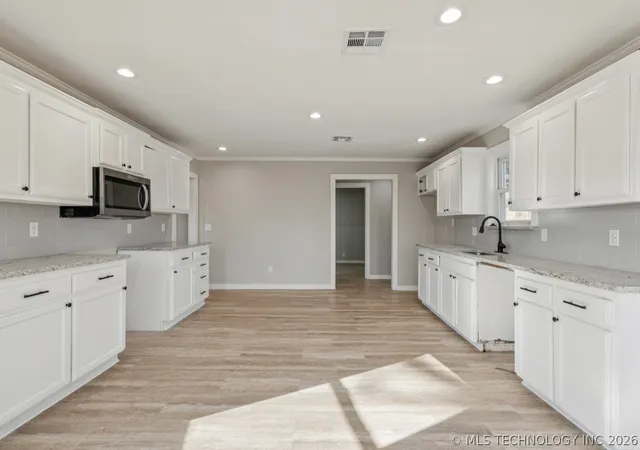 Photo 3 of Single family home for sale at 1228 S 76th Eastavenue, Tulsa, OK 74112 | MLS# 2625494 | Listing updated on 2026-09-01