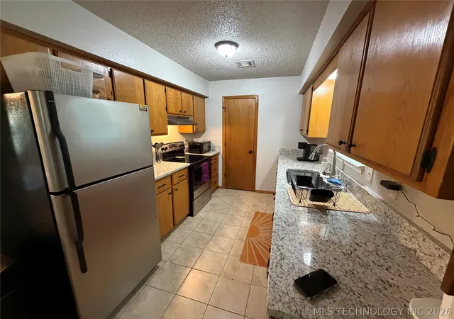 Photo 4 of Single family home for sale at 501 W Creek Dr, Okmulgee, OK 74447 | MLS# 2625447 | Listing updated on 2026-07-15