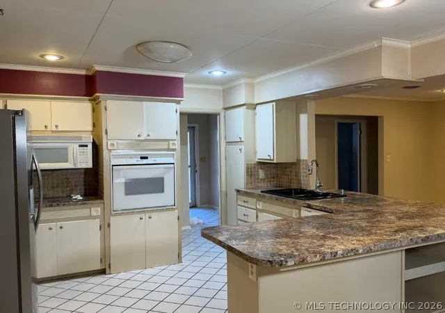 Photo 3 of Single family home for sale at 1733 Tiverton St NW, Ardmore, OK 73401 | MLS# 2627504 | Listing updated on 2026-07-27