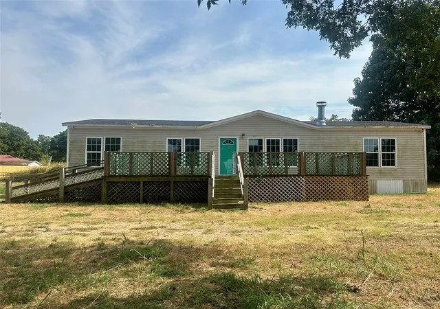 Photo 2 of Manufactured home for sale at 202 E I Ave, Milburn, OK 73450 | MLS# 2629442 | Listing updated on 2026-09-24