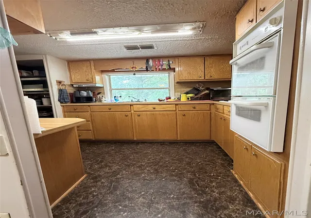 Photo 3 of Single family home for sale at 4451 Airport Rd, Millbrook, AL 36054 | MLS# 587527 | Listing updated on 2026-10-07