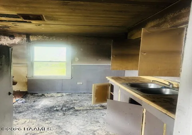 Listing Photo 3 - Condo for sale in building located at 411 & 413 1st St, Jennings, LA 70546