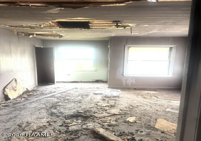 Listing Photo 2 - Condo for sale in building located at 411 & 413 1st St, Jennings, LA 70546