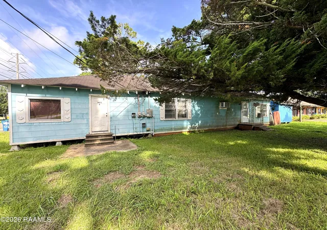 Listing Photo 2 - Condo for sale in building located at 1403 Johnson St, Jennings, LA 70546 - Unit #
