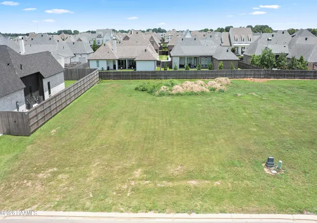 1st image of 401 Sunset Palm Ct, Youngsville, LA 70592 | MLS# 2600005021