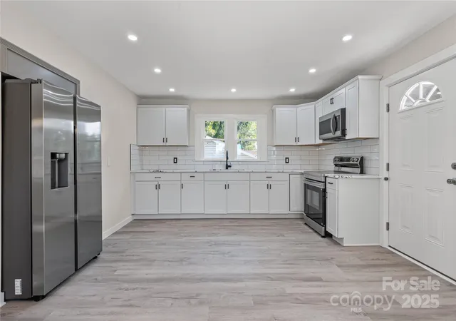 Photo 5 of Single Family Residence at 403 Julius Chambers Ave, Mount Gilead, NC 27306 | MLS# 4298336 | | Sold on 2026-01-22
