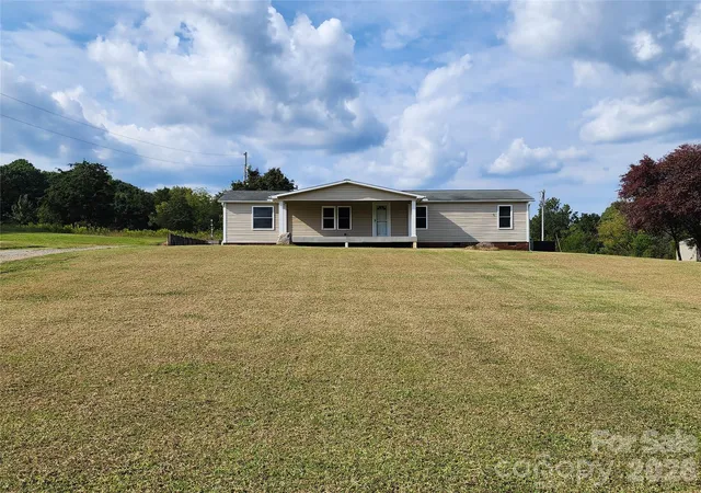 Photo 3 of Single family home for sale at 303 Johnson Dairy Rd, Mooresville, NC 28115 | MLS# 4303306 | Listing updated on 2026-09-23