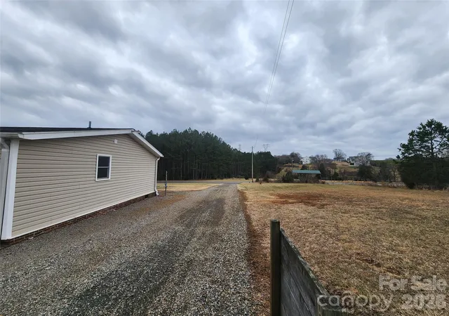 Photo 4 of Single family home for sale at 303 Johnson Dairy Rd, Mooresville, NC 28115 | MLS# 4303306 | Listing updated on 2026-09-30