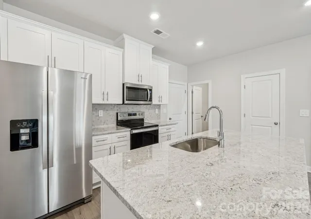 Photo 3 of Townhouse for sale at 104 Ciara Pl #B, Mooresville, NC 28115 | MLS# 4308207 | Listing updated on 2026-10-01