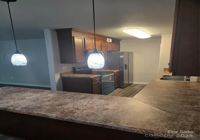 Photo 4 of Condominium at 133 Orchard Tr Ln #6, Charlotte, NC 28213 | MLS# 4310482 | | Sold on 2026-02-26