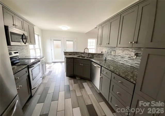 Photo 2 of Single family home for sale at 7508 Free Ct, Charlotte, NC 28216 | MLS# 4349140 | Listing updated on 2026-09-22