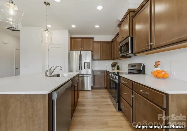 Photo 4 of Townhouse for sale at 6543 Fire Lily Ln, Charlotte, NC 28216 | MLS# 4351859 | Listing updated on 2026-10-14