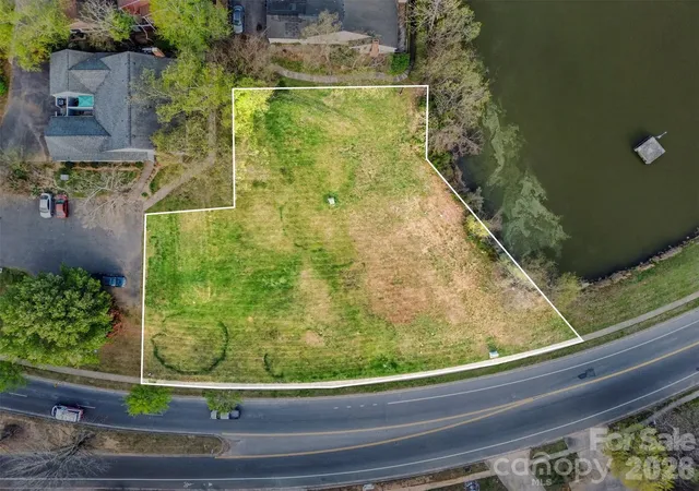 Photo 1 of Land for sale at 1725 Village Lake Dr, Charlotte, NC 28212 | MLS# 4360256 | Listing updated on 2026-04-20