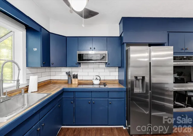 Photo 4 of Single family home for sale at 23 Springwood Dr, Asheville, NC 28805 | MLS# 4365304 | Listing updated on 2026-04-15