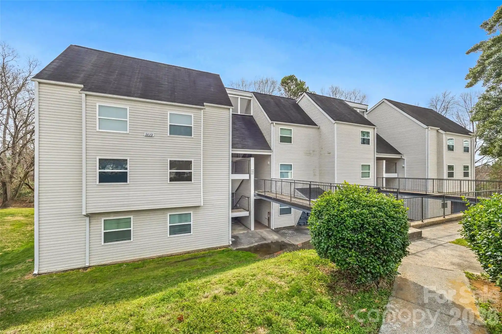 Listing Photo 1 - Condo for sale in 9119 Spyglass Pl located at 9119 Spyglass Pl, Charlotte, NC 28214 - Unit #9119D