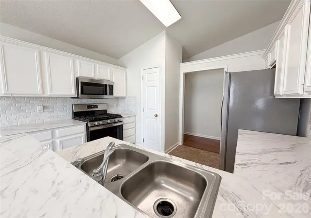 Photo 2 of Single family home for sale at 12525 Panthersville Dr, Charlotte, NC 28269 | MLS# 4368195 | Listing updated on 2026-10-08