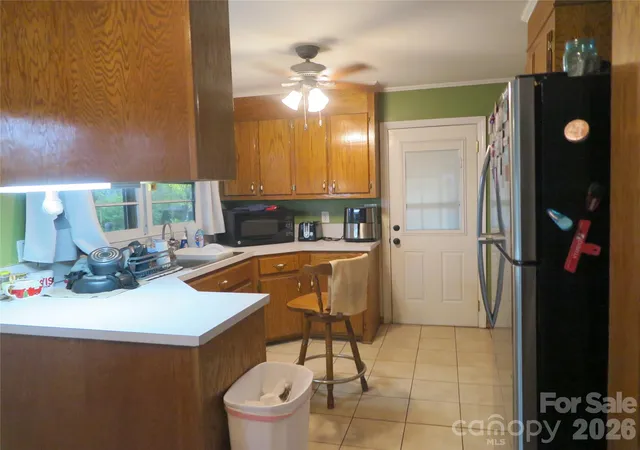 Photo 4 of Single family home for sale at 419 S Church St, Lowell, NC 28098 | MLS# 4370437 | Listing updated on 2026-09-22